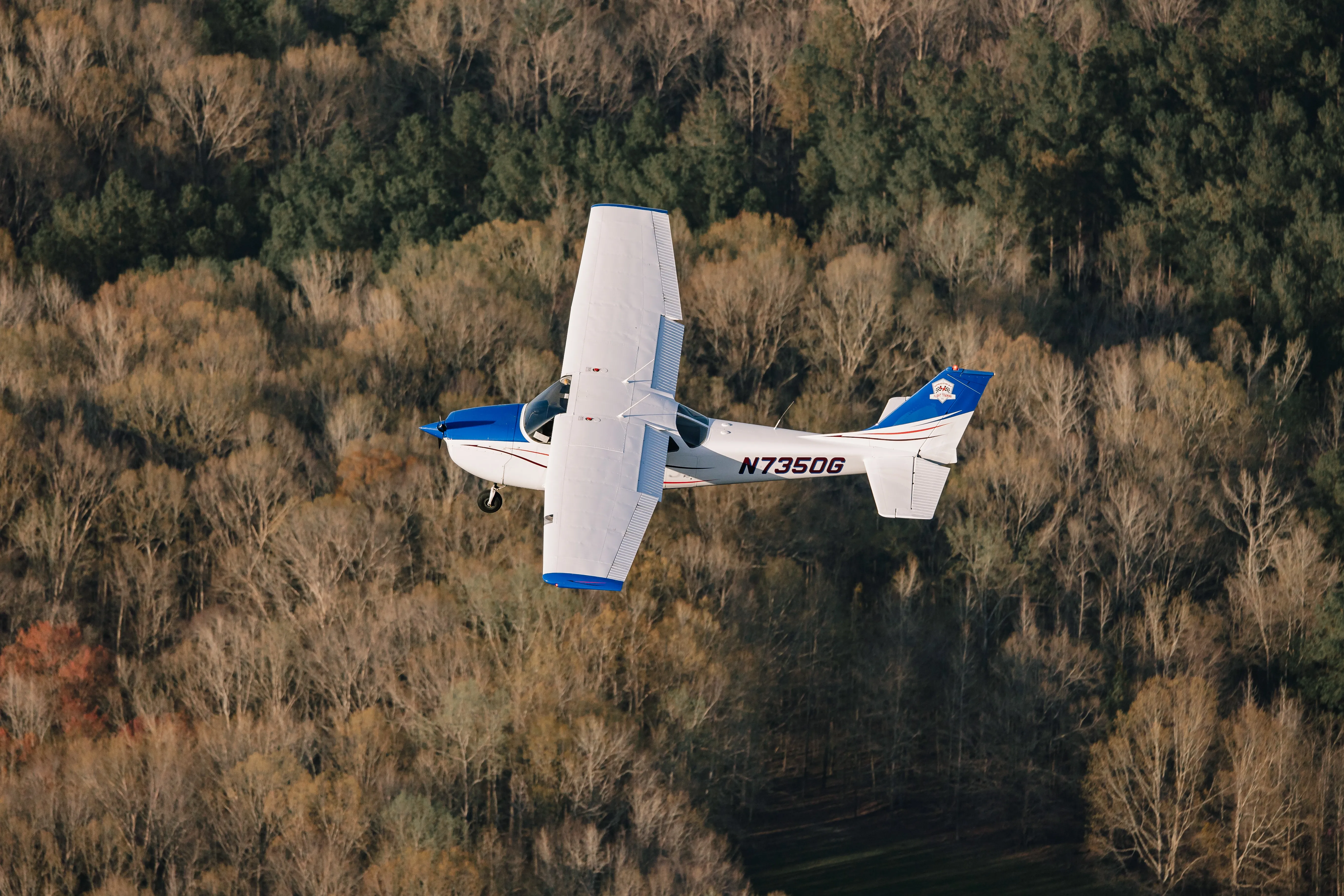 Student and instructor performing spin training in certified aircraft